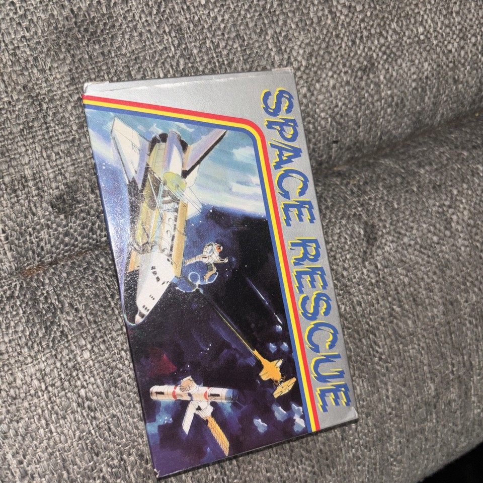 Purple 1980s Tronica Space Rescue handheld — a genuine space-age relic with insane retro aesthetic that most people have never seen in the wild.