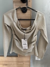 Top a costine Zara taglia L