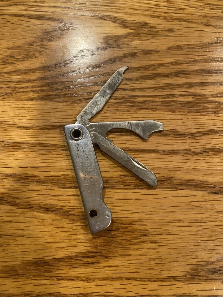 A multi-tool pocket knife branded for Skelly Oil — a defunct mid-century gas station chain — making it a rare piece of petroliana history you can carry.