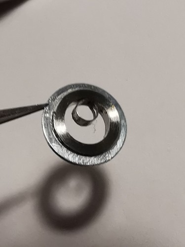 Ressort De Barillet Pour Montre - Dimensions : Hauteur 1,3 Mm, Diamètre 11,5 Mm. Marque Mondial, Neuf