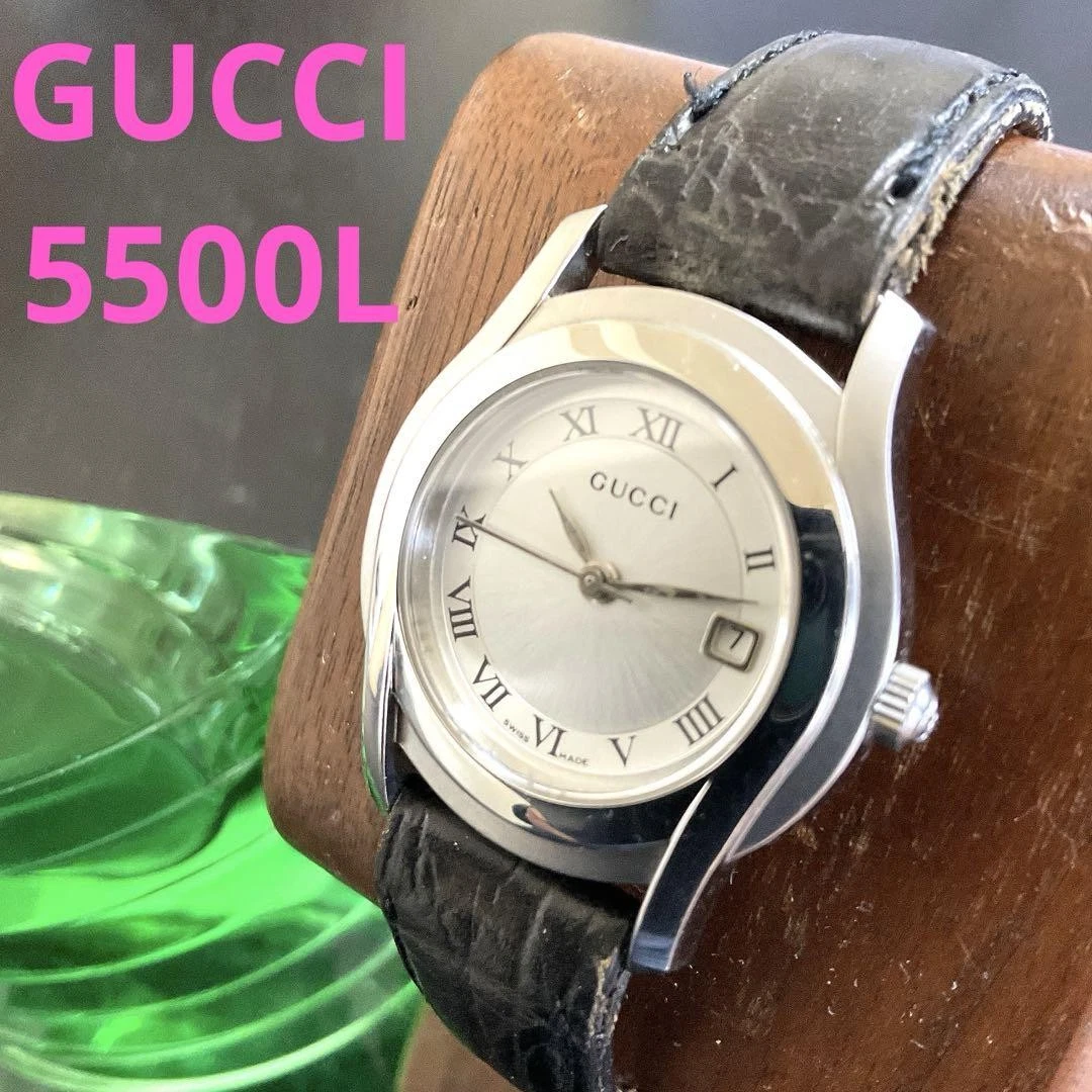 Montre femme Gucci 5500L à quartz   pile remplacée, design simple, occasion