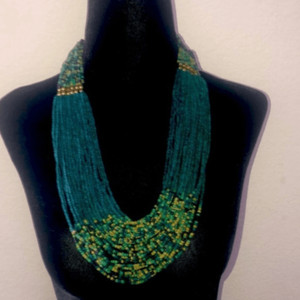 Vintage  multi strand layer hand made beaded necklace with gold tones