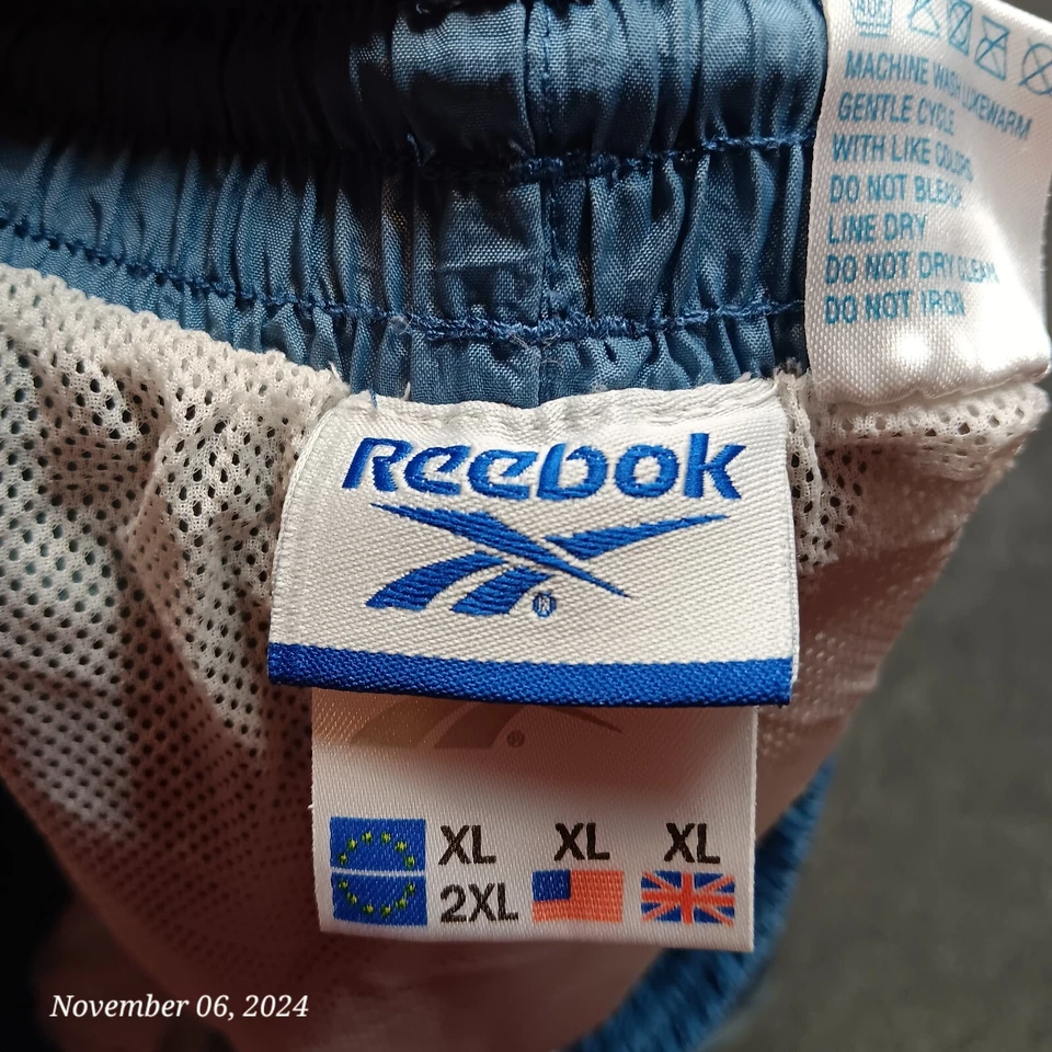 Bañador corto Reebok vintage para hombre XL azul desteñido malla forrado Foto 4 de 4
