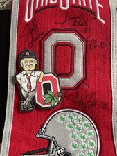 OSU BANNER & WOODY WOODEN CUTOUT . Autographed Banner 8 X 32”