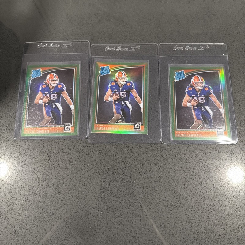 **3** 2021 PANINI CHRONICLES DRAFT PICKS 201 TREVOR LAWRENCE GREEN