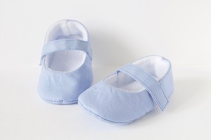 light blue baby shoes