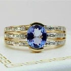 3.00Ct Oval Cut Lab Created Tanzanite Women's Band Ring 14K Yellow Gold Plated