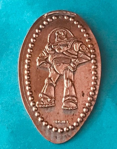 BUZZ LIGHTYEAR TOY STORY CONTEMPORARY RESORT PRESSED RETIRED DISNEY PENNY