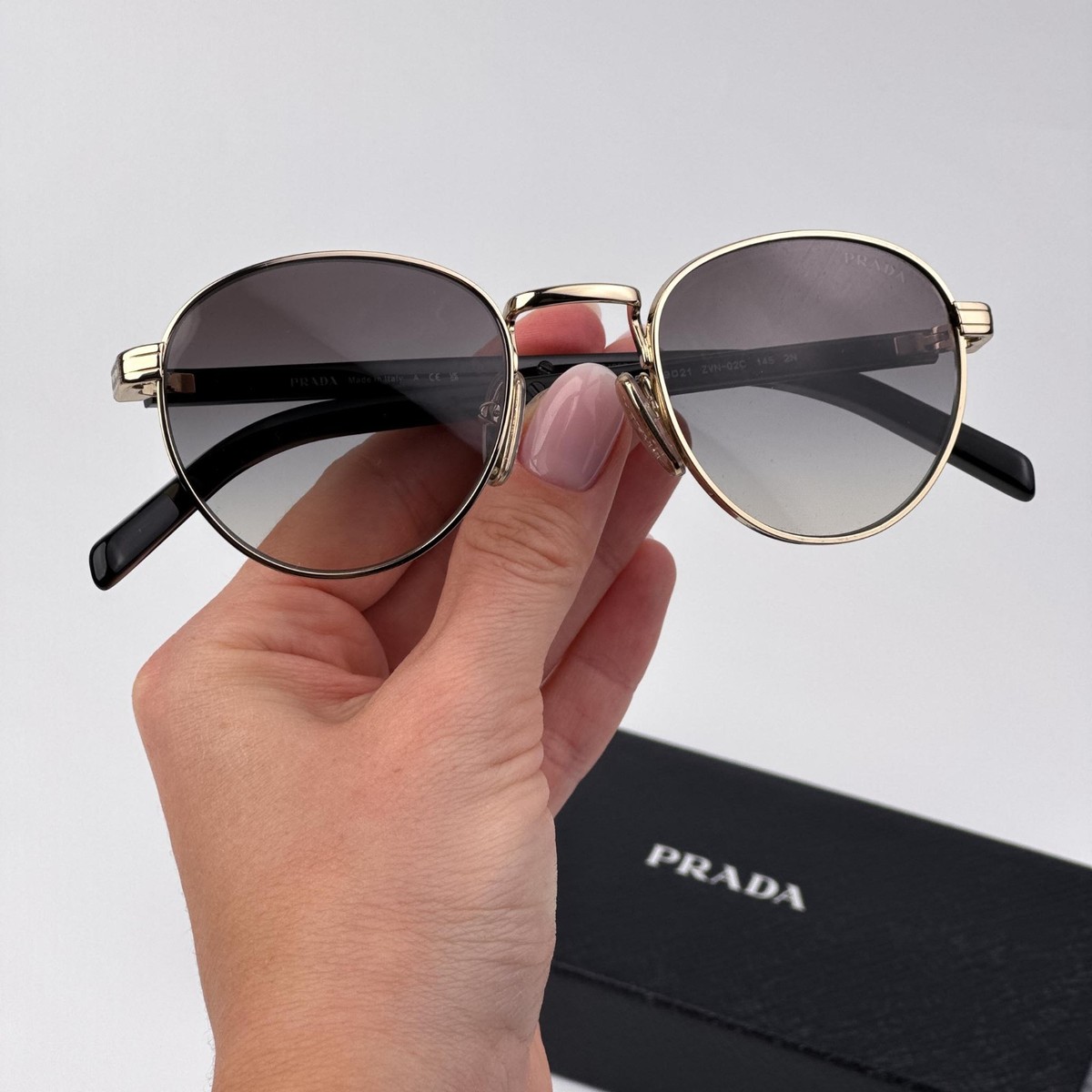 Prada Women Sunglasses Gold Grey Gradient Round PRB52S  display picture 1