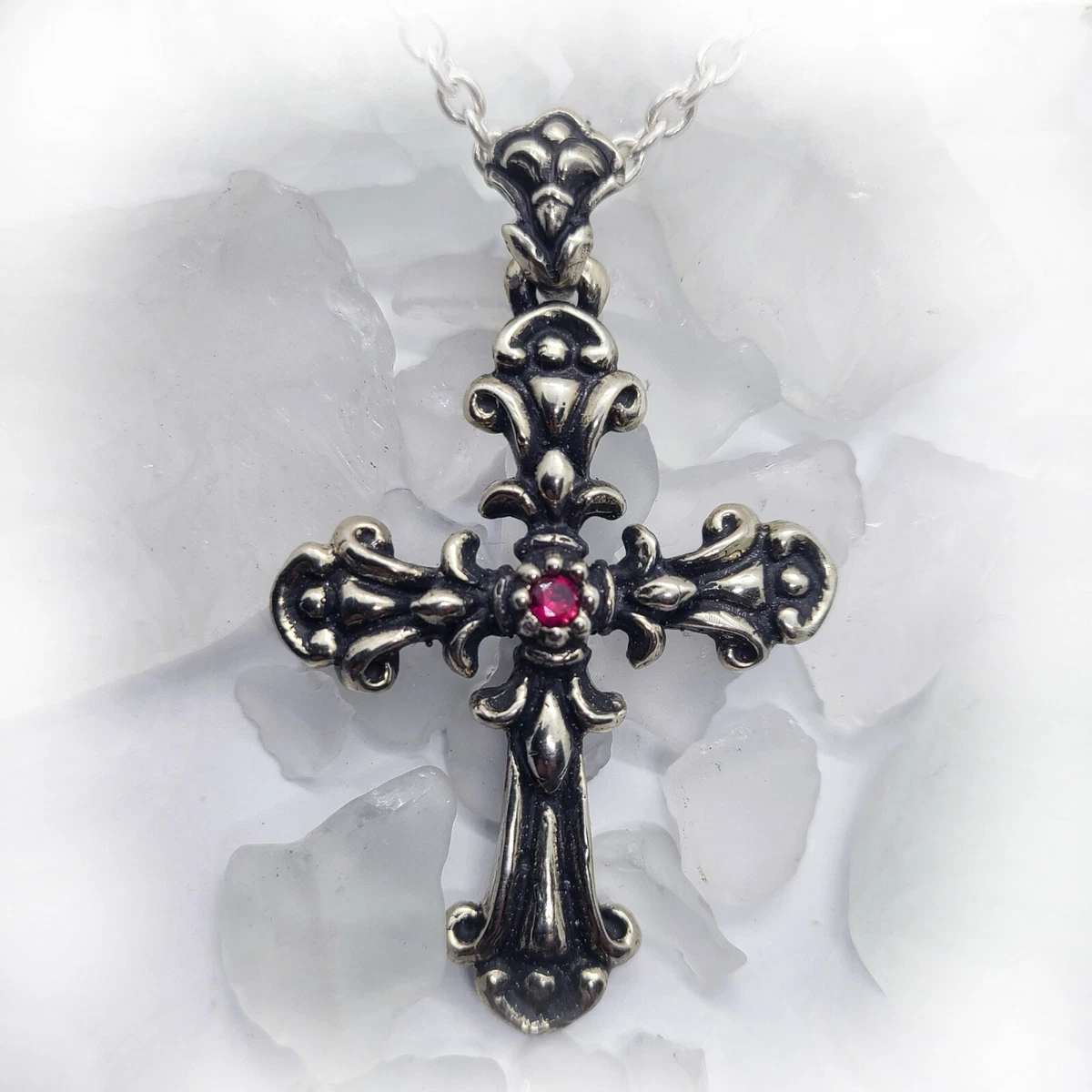 Cross with ruby best sale stone