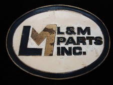OC05101 VINTAGE 1970s  L M PARTS INC.  COMPANY BRASSTONE BELT BUCKLE