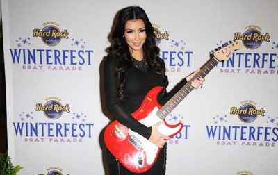 Kim Kardashian attends the Winterfest Boat Parade at Council Oak a- Old Photo 8