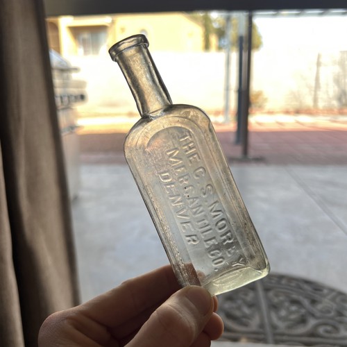 The CS Morey Mercantile Co. Denver  6 1/2" Antique 4 oz Glass Bottle
