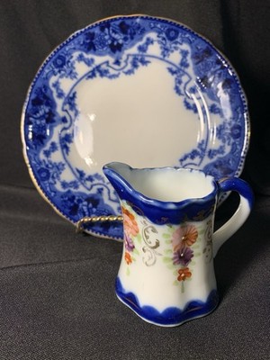 Two Flow Blue Items:  Salad, Dessert Plate 7 1/2'' & Small Pitcher 3 1/4''