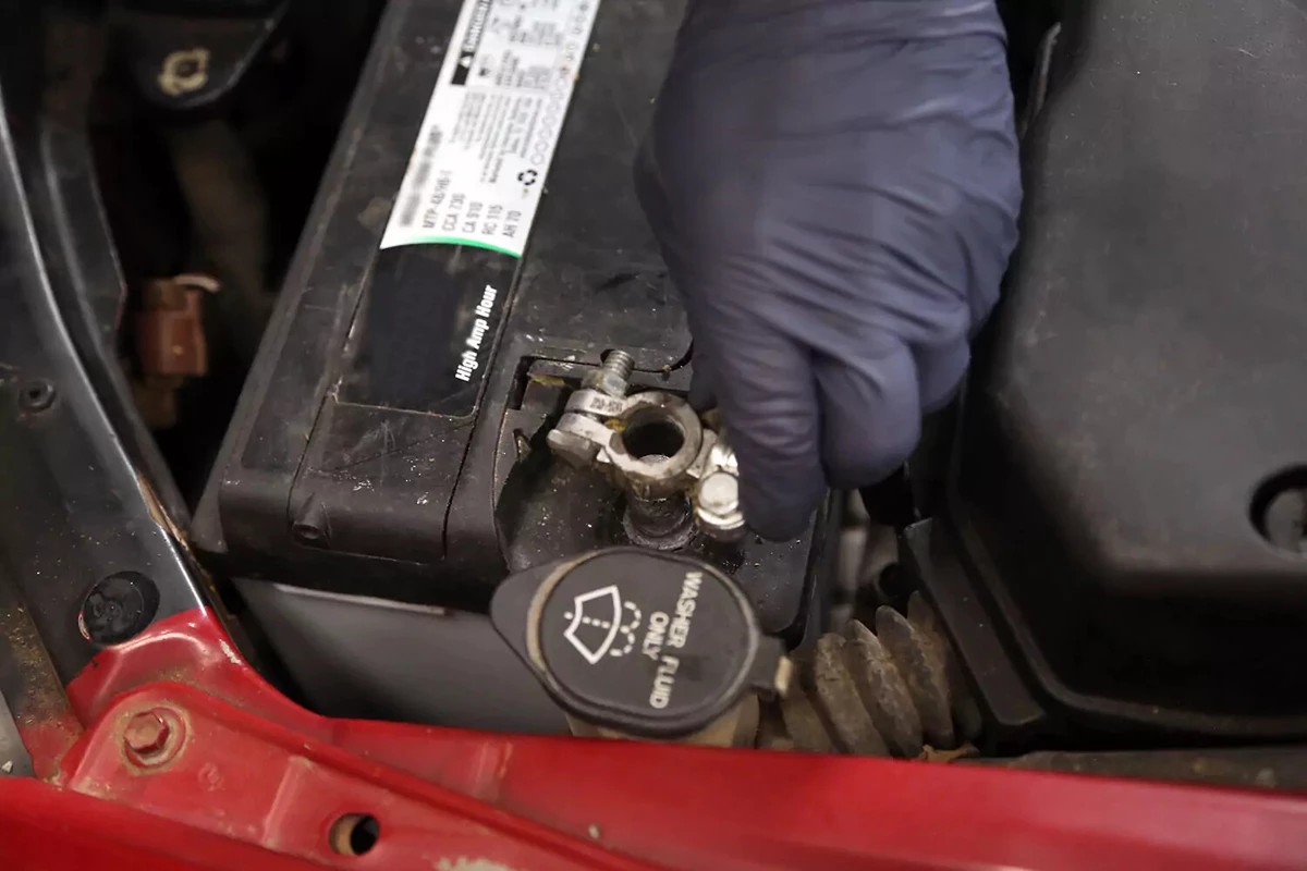 Removing the negative battery cable.