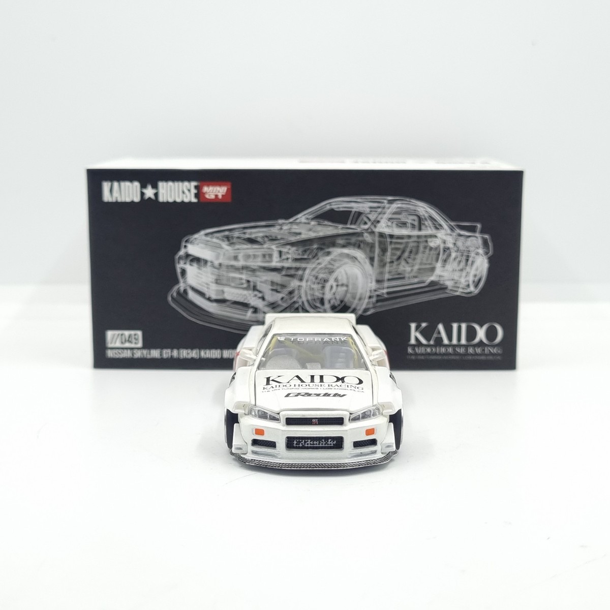 Mini GT Kaido House Nissan Skyline GT-T R34 Kaido Works V2 White