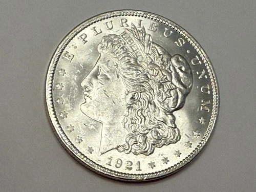 1921 Morgan U.S. silver dollar. Satiny white BU. #em3