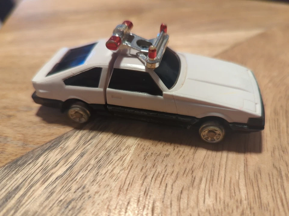 Винтажная головоломка GOBOTS 1984 Bandai Tonka Combiners японский полицейский автомобиль - Изображение 2 из 4