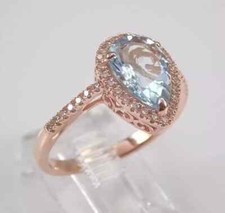 Pear Cut Simulated Aquamarine 925 Silver Engagement Ring In 14k Rose Gold Plated