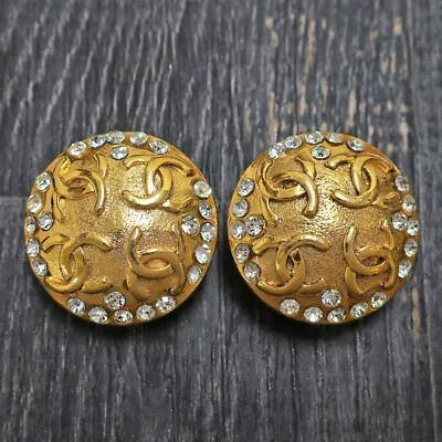 Boucles d'oreilles clips rondes vintage strass logos CC plaqué or CHANEL #394... - Photo 1/4