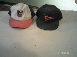 2 Orioles hats