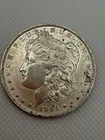 1884 (O) Morgan Silver Dollar  AU details cleaned