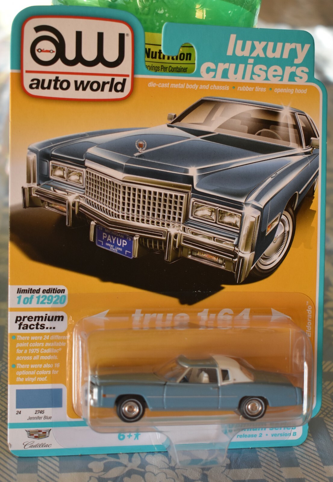 AUTO WORLD 1975 CADILLAC ELDORADO 1:64 1 OF 12920 NEW
