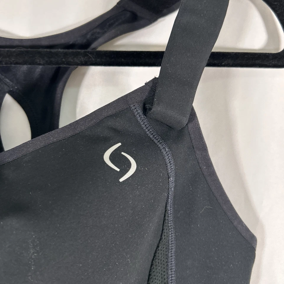 Sujetador deportivo Moving Comfort para mujer 32C negro gancho ojo acolchado inalámbrico Foto 2 de 4