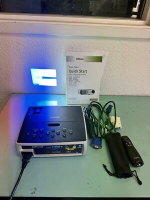 InFocus Projector IN1100 Model: W1100 w Manuals, cables, carrying case