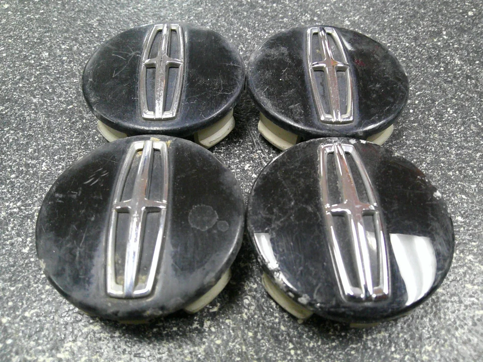 Tapas centrales negras Lincoln MKC OEM 2-1/8" 54 mm DPSC-1A096-AA BA - Juego/4 Foto 2 de 4