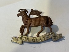 QUEENS ROYAL REGIMENT (WEST SURREY) CAP BADGE.