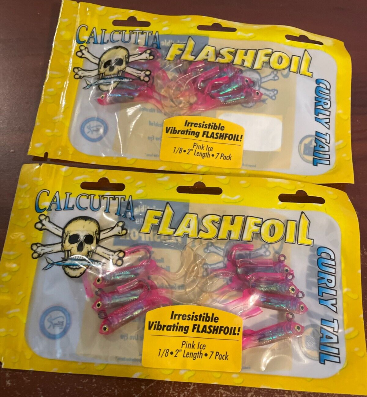 Calcutta flashfoil swim jigs two packs equals 14 jigs curl tails swimbait pink