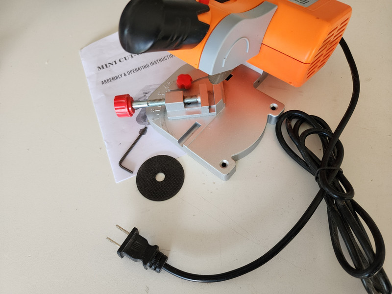 Mini Circular Miter/ Chop Saw with a 2" Wood Blade and Extra Metal cutting Blade