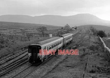 PHOTO  A 2-CAR 156 SETS 156438 HEADS AWAY FROM BLEA MOOR WITH THE 14.49 PASSENGE