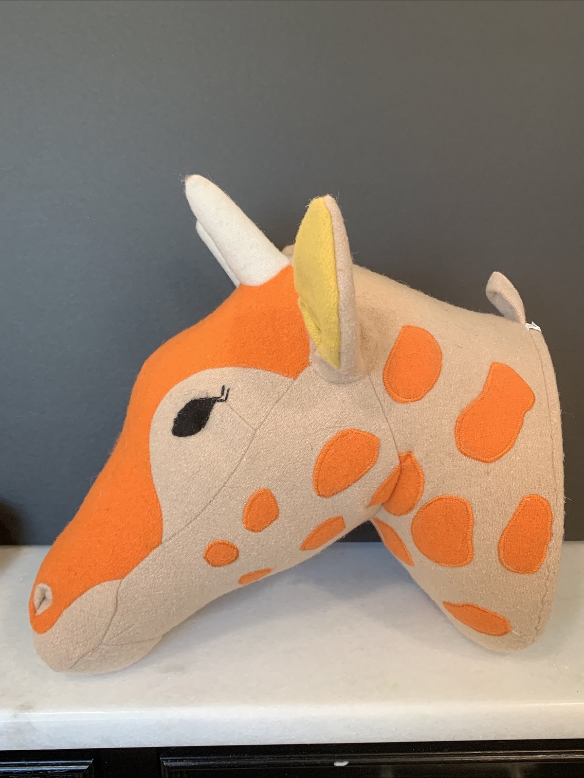 stuffed giraffe head wall mount