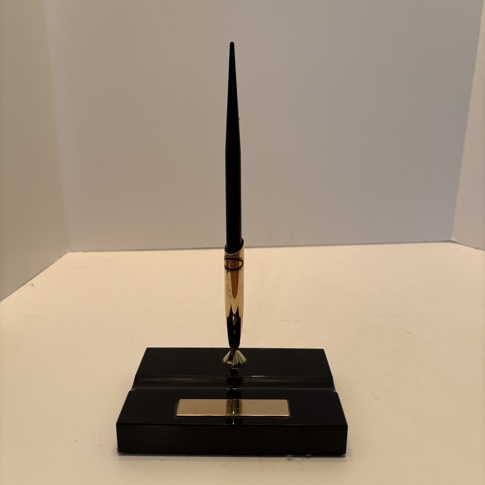A genuine Sheaffer Mad Men-era desk pen set with a blank nameplate — you can actually engrave it, making it a surprisingly personal vintage gift.
