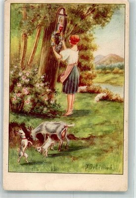 39738417 - signed Ortinuro goatherdess adorns a crossroads with a