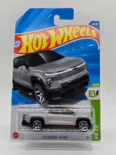 2025 Hot Wheels Silverado EV RST Truck 1/64 Scale Silver HW EV Series Intl Card