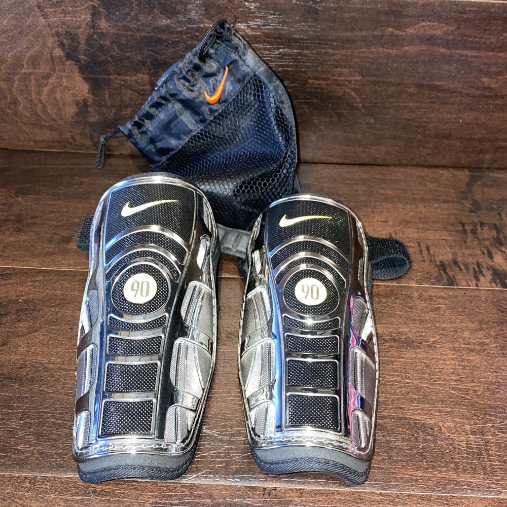 Nike 90 Shin Guards with Adjustable Straps in Black and Silver, Size Large