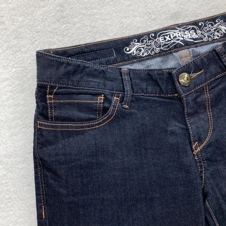 Pantalones de mezclilla Express para mujer 6 lavados oscuros Zelda ajustados tiro ultra bajo Y2K Foto 3 de 4