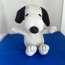 Plush Snoopy with Pocket in his back. Peanuts