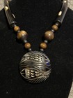 Tribal buffalo horn necklace with Round fish carved pendant — photo 6