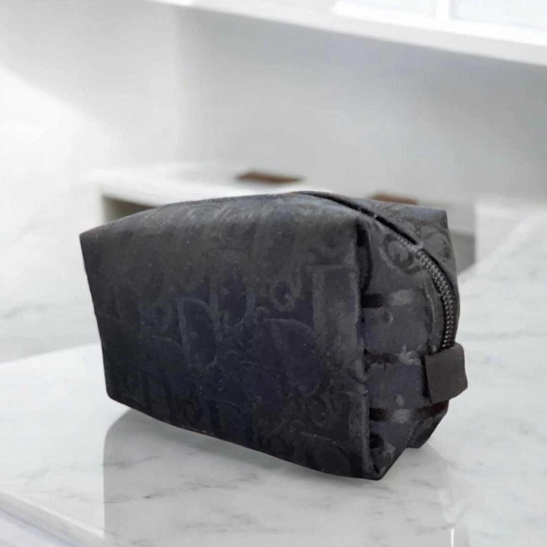 Pochette Christian Dior trotteur imprimé intégral noir du Japon occasion très bon état