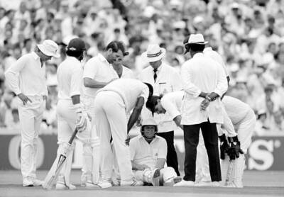 Concern for England fielder John Morris who had been struck - Old Cricket Photo