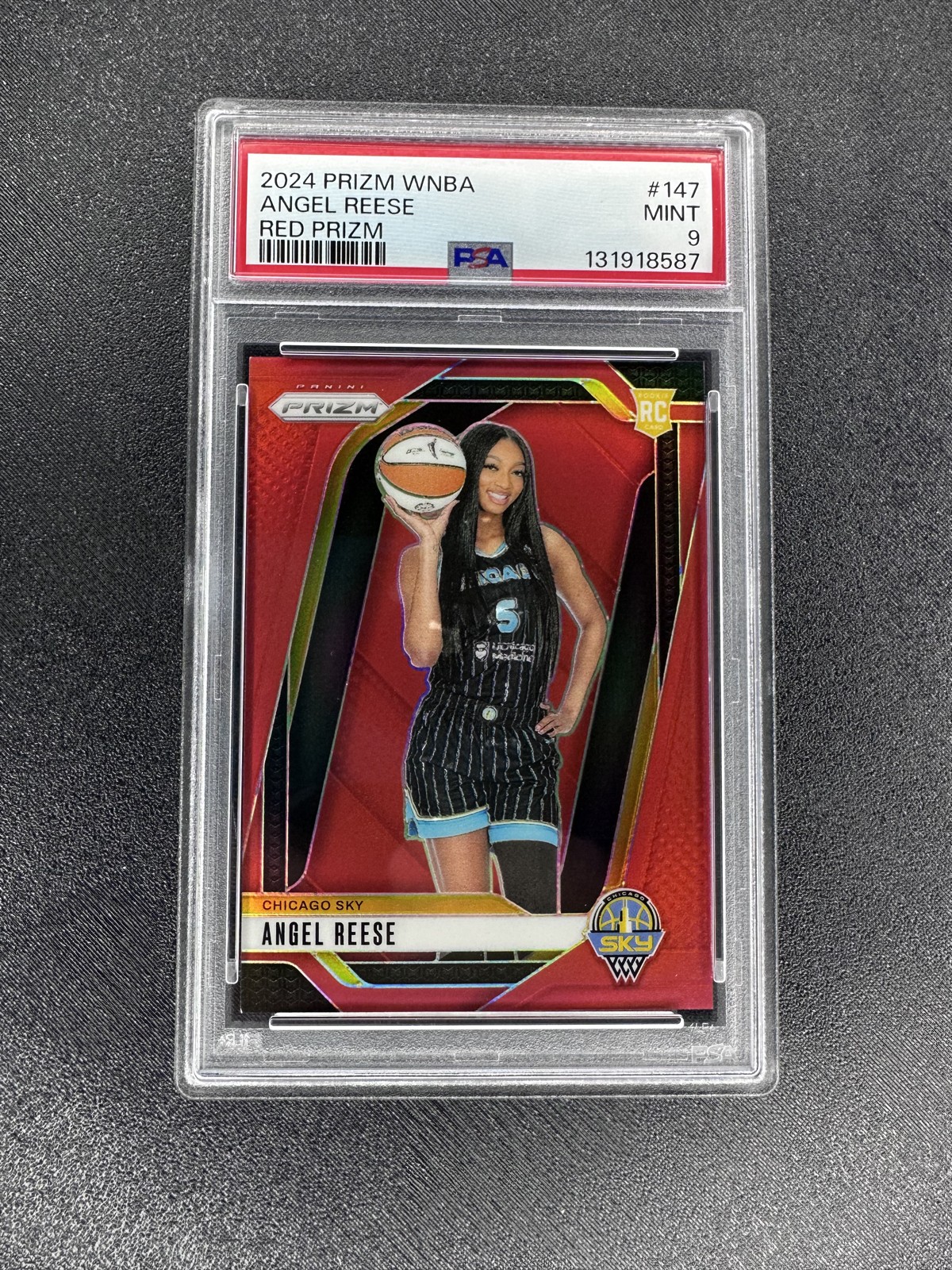 2024 Panini Prizm WNBA - Angel Reese #147 Red Prizm /299 (RC) PSA 9 view 1