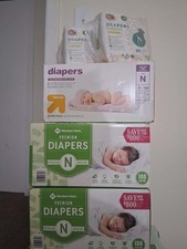newborn diapers bulk 3 boxes of 108 count and 2 bags of 20 count