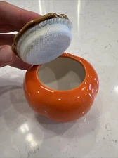 Handcrafted persimmon-like containers/jars