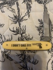 I Don’t Call 911 JF Novelties One Blade Lockback Pocket Knife. Cream Color