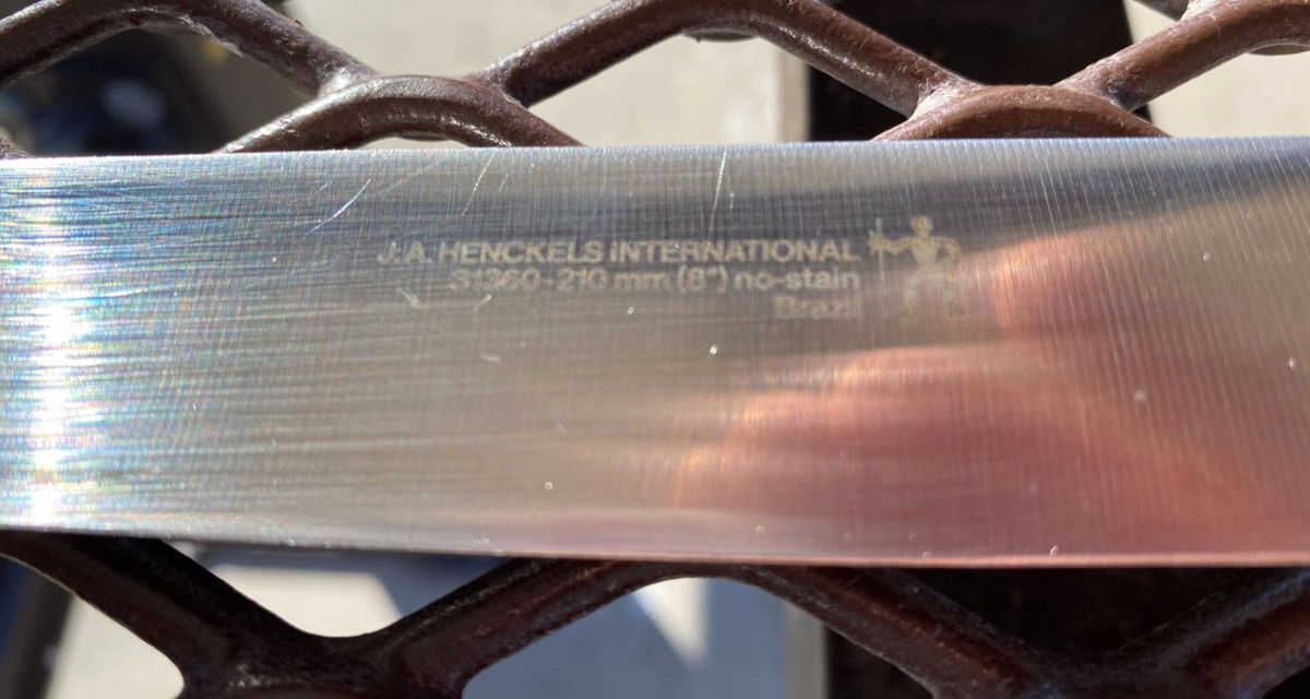 J A Henckels International 8'' Chef/Utility Knife- Wood Handle