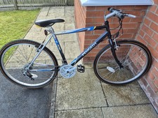 Peugeot mountain bike, which appears to be a vintage model